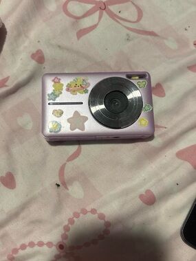Compact Pink Digital Point-and-Shoot Camera with Cute Sticker Accents